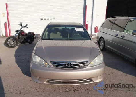 2006 Toyota Camry Le from USA, damaged, VIN 4T1BE32K06U716663